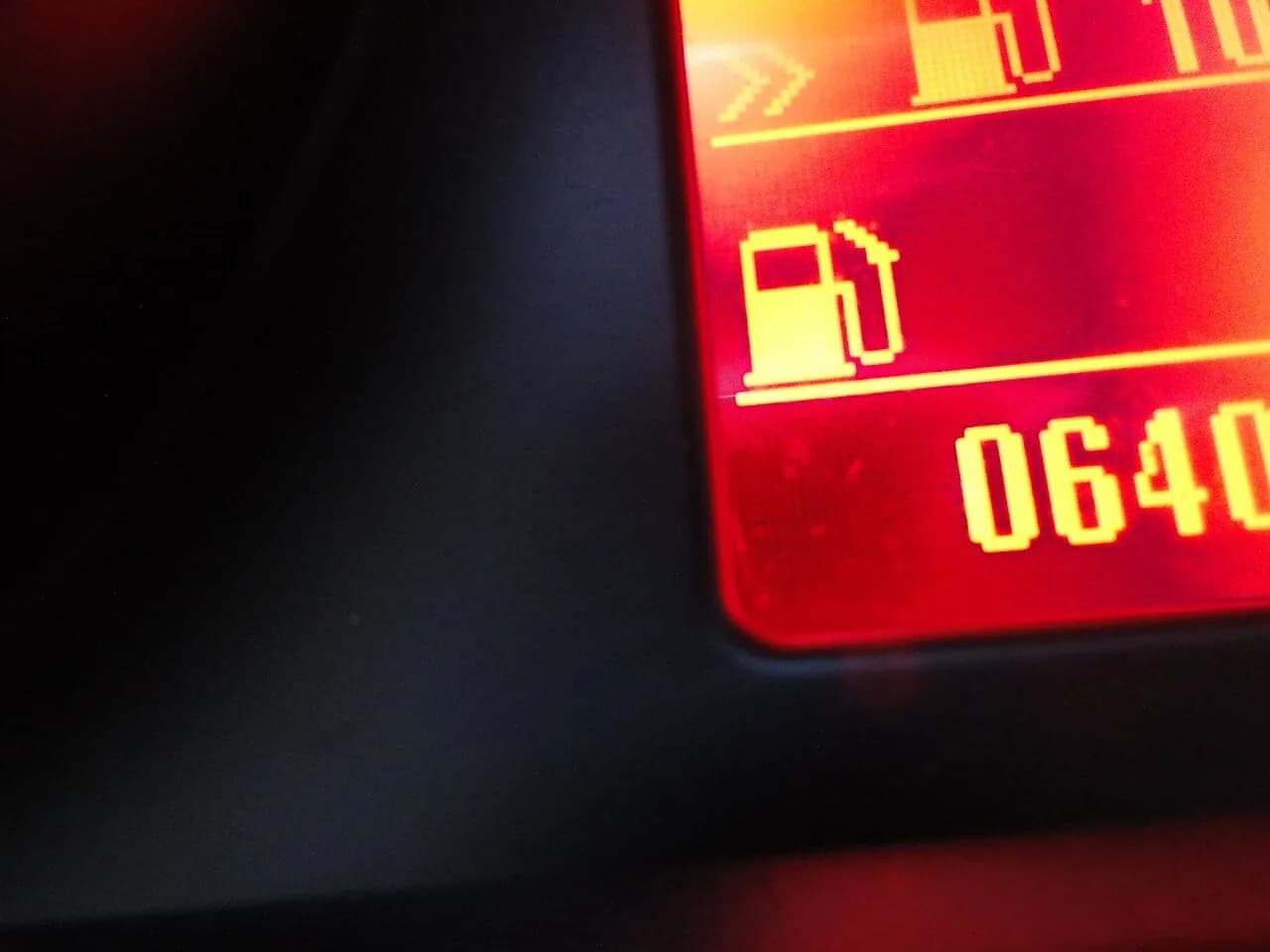 Close-up of a car's illuminated dashboard display